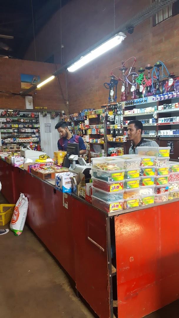 AT LAAS SUPERMARKET &amp; TAKEAWAY