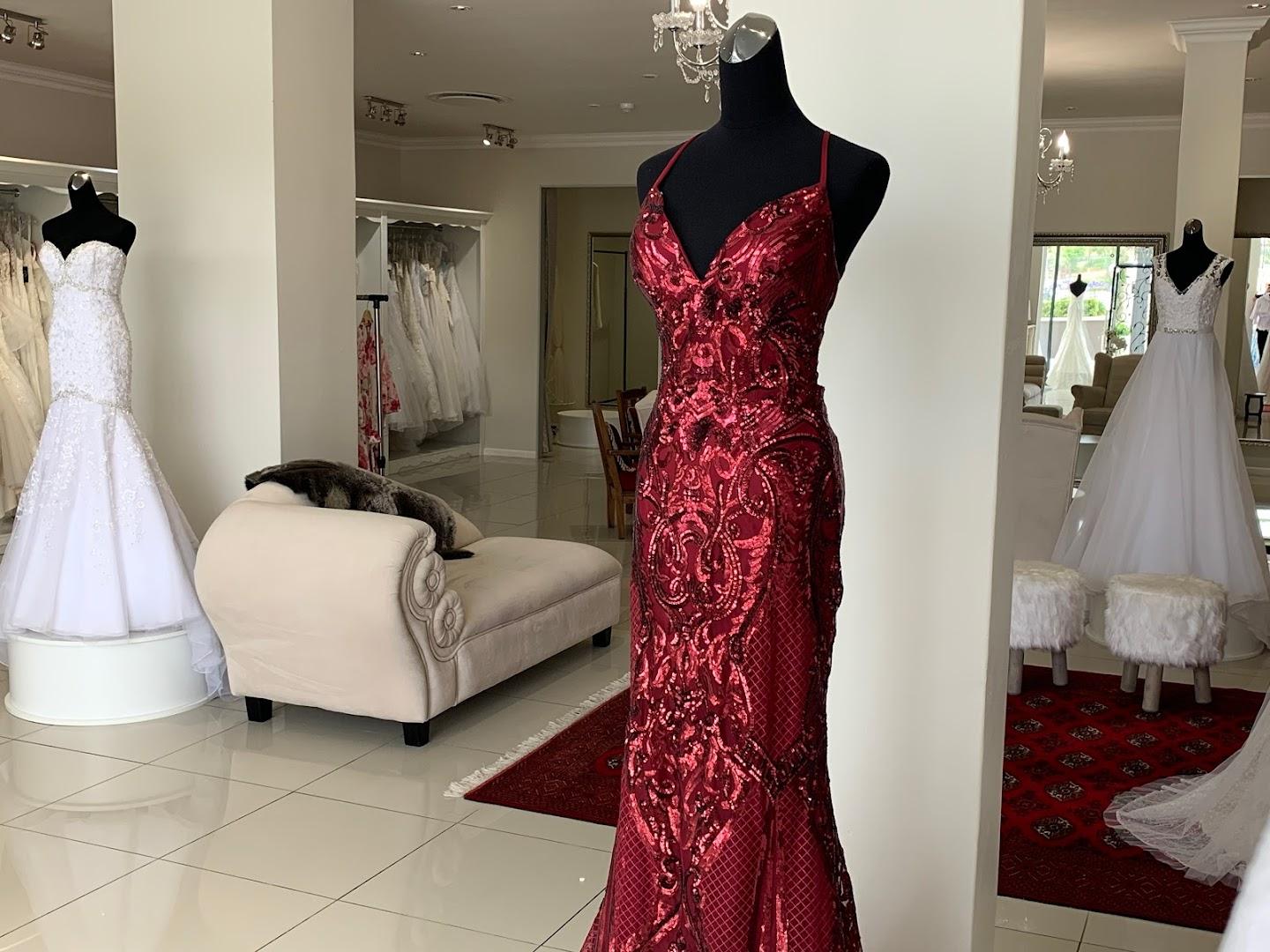 Trés Jolie Bridal and Evening Wear